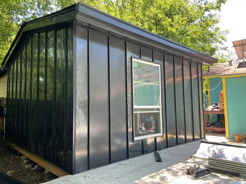 Black standing seam metal wall panels for Roof Inspection in Texarkana